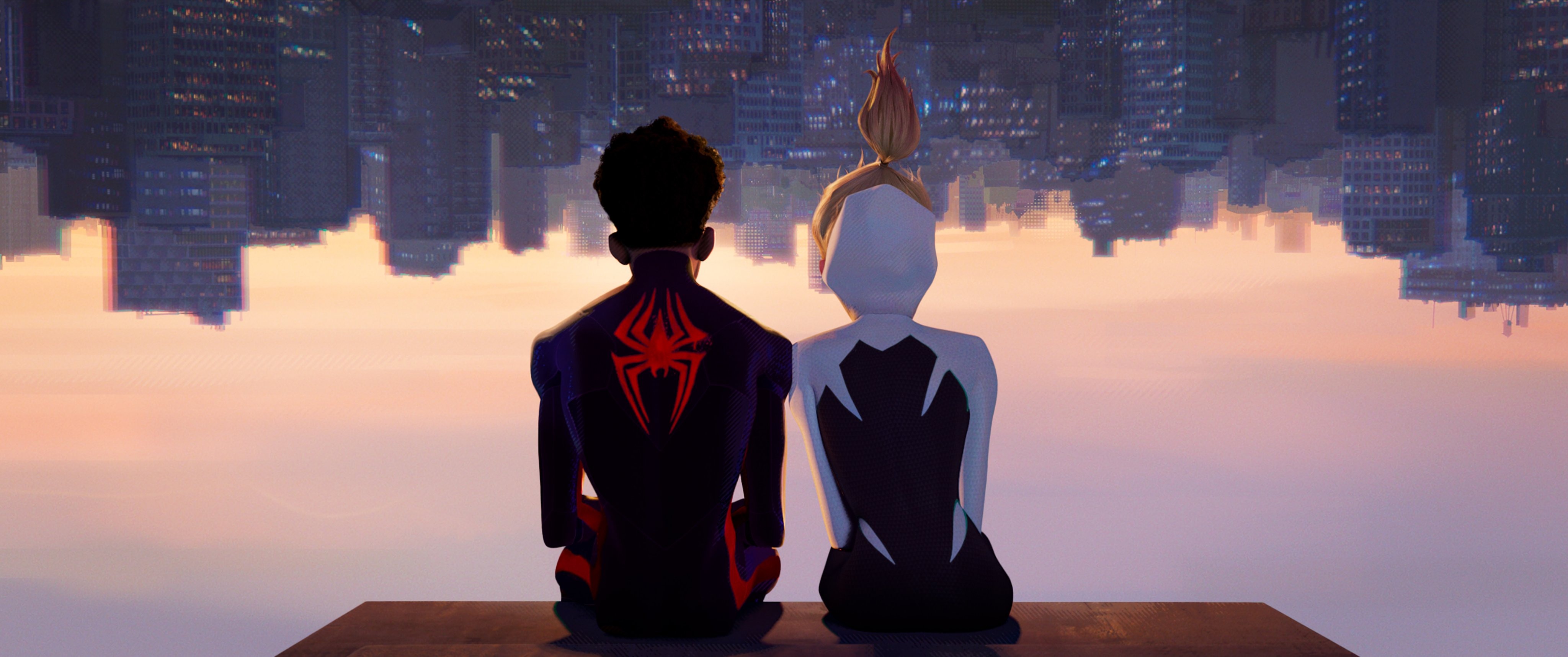 Spider-Man and Gwen sitting above the city